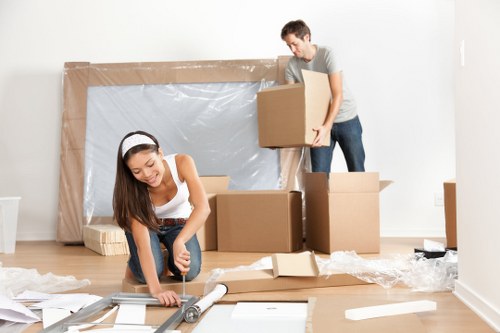 Flat removals in Kensalgreen with movers loading boxes into a van
