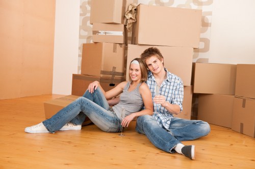 Student moving boxes into secure storage in Kensalgreen