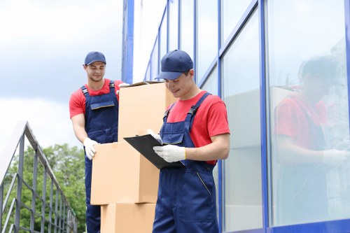 Packed boxes and furniture in a storage unit
