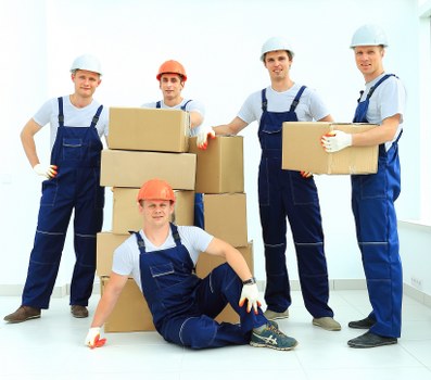 Careful packing for flat removals in Kensalgreen with labelled boxes